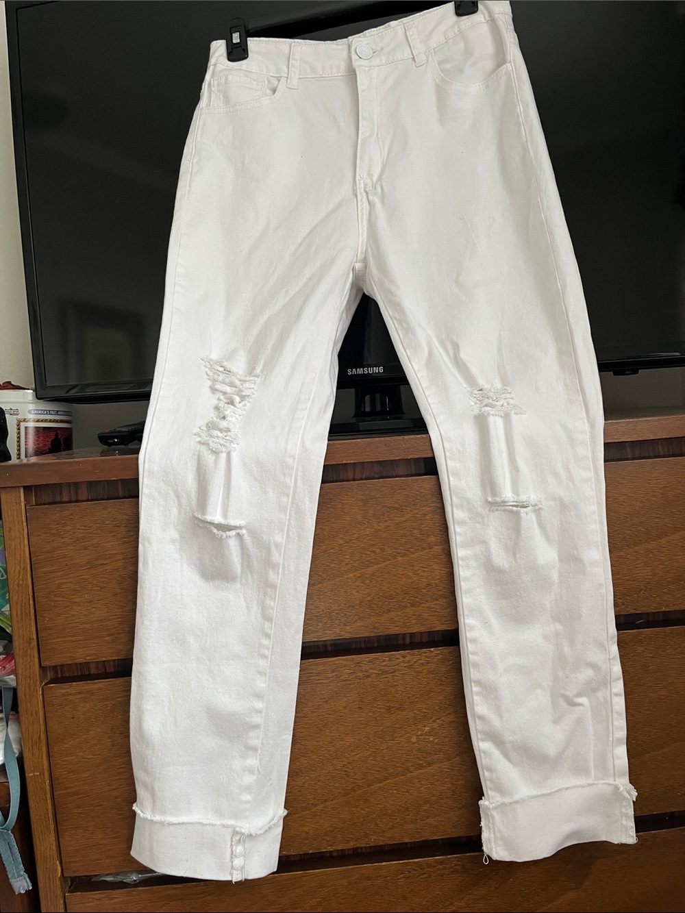 White Ripped women’s jeans. 97 percent cotton. Size 13 junior….